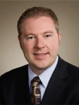 Travis L. Delucenay