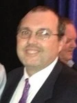 Andrew C Burrell