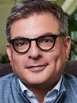 Len M. Garza