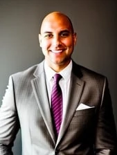 Micah J Longo