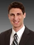 Adam K Schulman