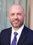 Adam E. Brigman