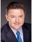 Brian E. Holthus