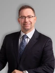 Raymond E. Oster