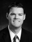 Seaton J. Curran