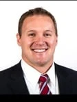 Dustin J. Plumadore