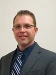 Justin E. Oakes