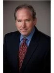 Mark E Munson