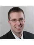 Adam B Marks