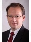 Eric E Kalnins