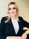 Magda L Janicki