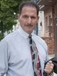 Dennis E Cuomo