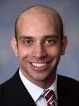 Michael I. Assad