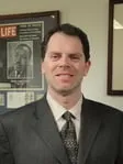 Andrew R Miller