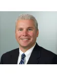 Daniel E. Coots