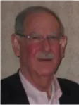 Andrew G Brucker
