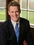 Mark A. Linder