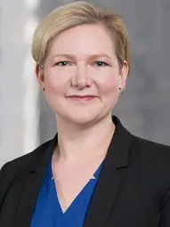 Laura A Sell
