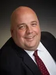Scott A. Brenneck