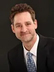 Eric L Lewis