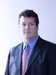 Gregory A Miller