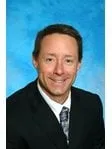 Charles E Trullinger
