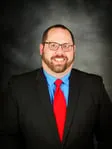Justin M Daake