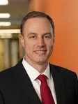 Mark E. Schmidt