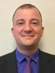 John E. Schlosser