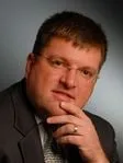 Christopher B Younger