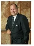 Dennis J Quinn