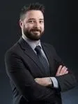 Derek C. Julio