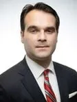 John P. Buza