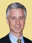 John P Deckers
