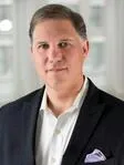 Scott E. Reid