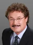 Thomas E Bauer