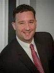 Eric M Brown