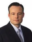Gregory E. Garman