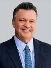 James E Simpson