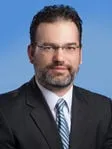 Joshua E. Menard