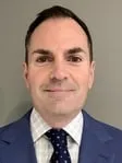 Justen E. Grech