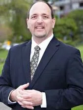 Gregory A McBroom